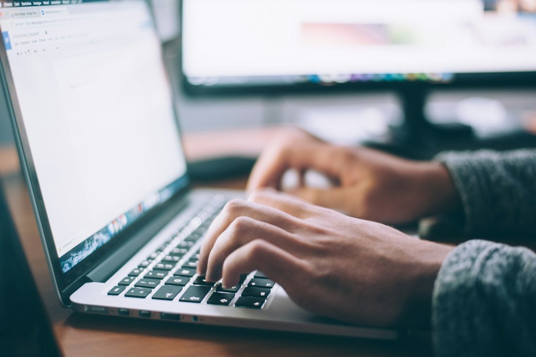 Illustrative photo of a person practicing digital skills on a laptop